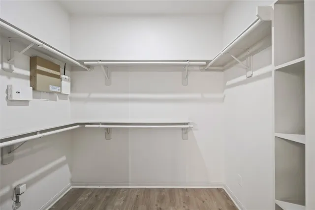 a view of an empty walk in closet