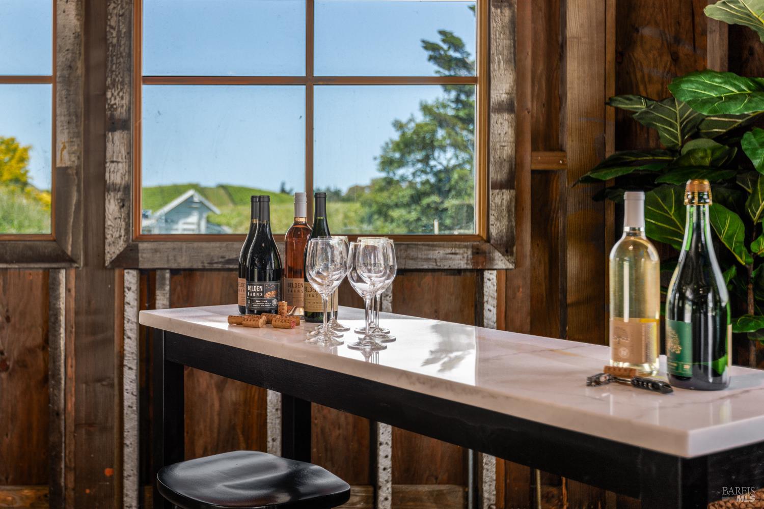 5561 Sonoma Mountain Road Santa Rosa, CA 95404 - Photo 12 of 70 a view of a dining room with furniture window and wooden floor