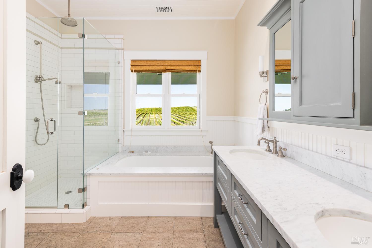 5561 Sonoma Mountain Road Santa Rosa, CA 95404 - Photo 15 of 70 a bathroom with a tub sink and mirror