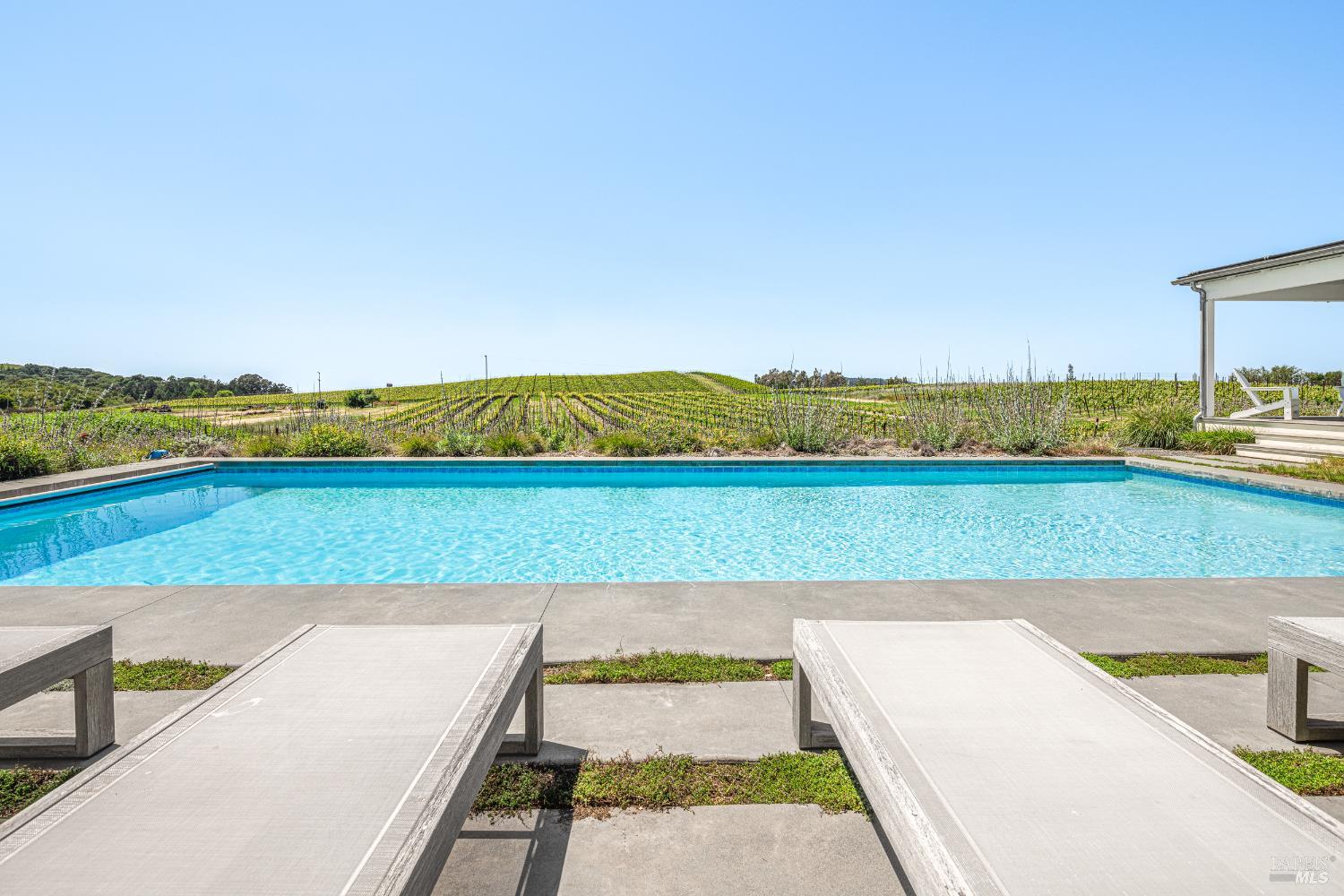 5561 Sonoma Mountain Road Santa Rosa, CA 95404 - Photo 17 of 70 a view of swimming pool with outdoor space and seating area