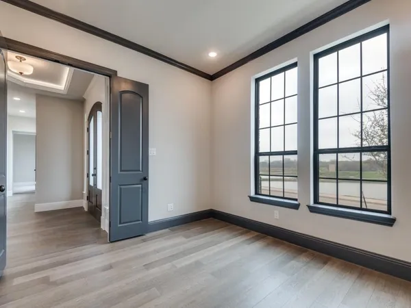 wooden floor and windows in a room