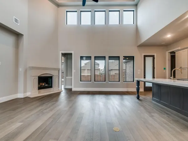 a view of livingroom with hardwood floor and a fireplace