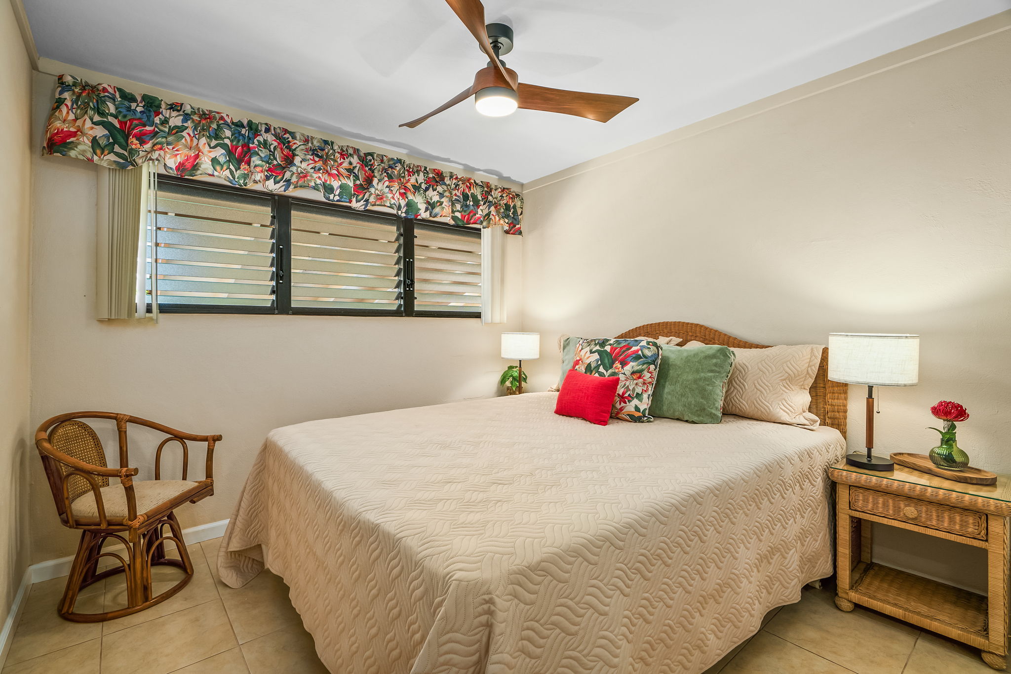 4451 Moana Road, Unit 309 Waimea, HI 96796 - Photo 17 of 21 a bedroom with a bed and a chandelier
