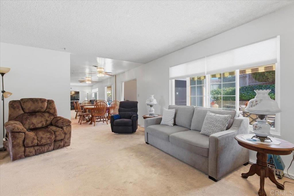 8773 Leigh Avenue Spring Valley, CA 91977 - Photo 14 of 30 a living room with furniture and a large window