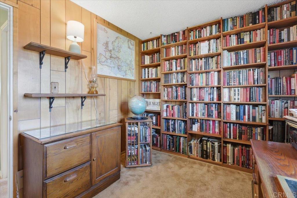 8773 Leigh Avenue Spring Valley, CA 91977 - Photo 23 of 30 a view of room with furniture and book shelf
