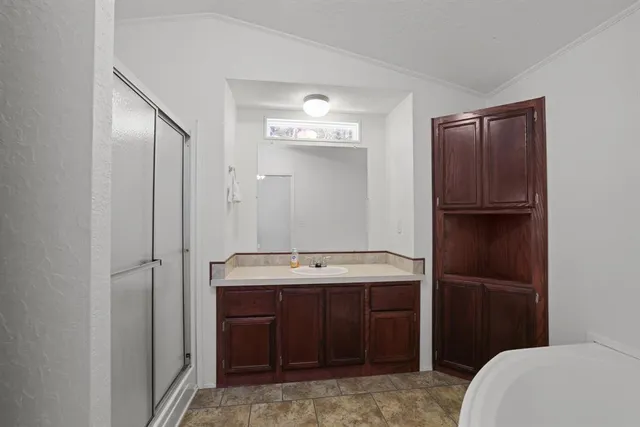 a bathroom with a sink and a toilet