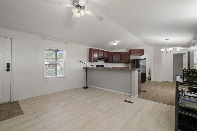 a view of kitchen with windows
