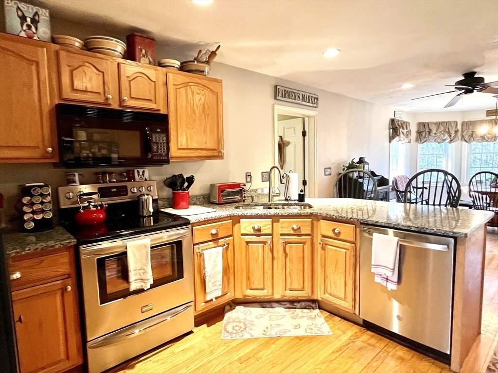 2 Pierce Circle Paxton, MA 01612 - Photo 11 of 31 a kitchen with stainless steel appliances granite countertop a sink and a stove