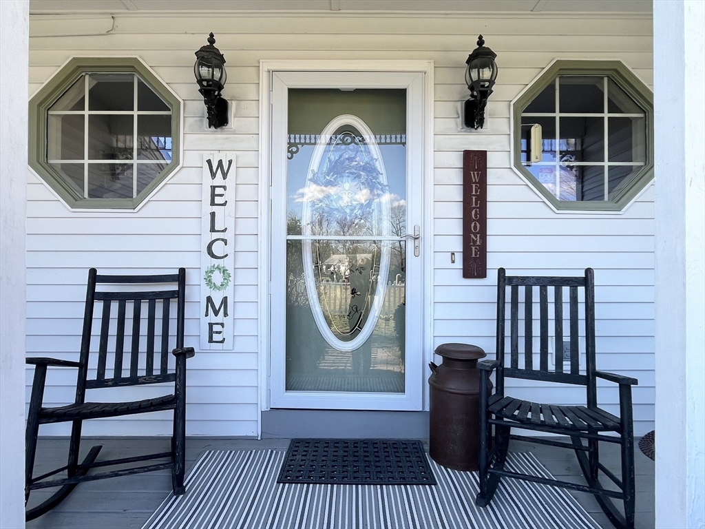 2 Pierce Circle Paxton, MA 01612 - Photo 2 of 31 a view of a deck with table and chairs