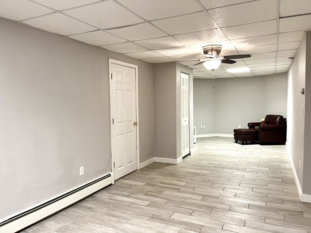 2 Pierce Circle Paxton, MA 01612 - Photo 25 of 31 a bedroom with a bed and a chandelier