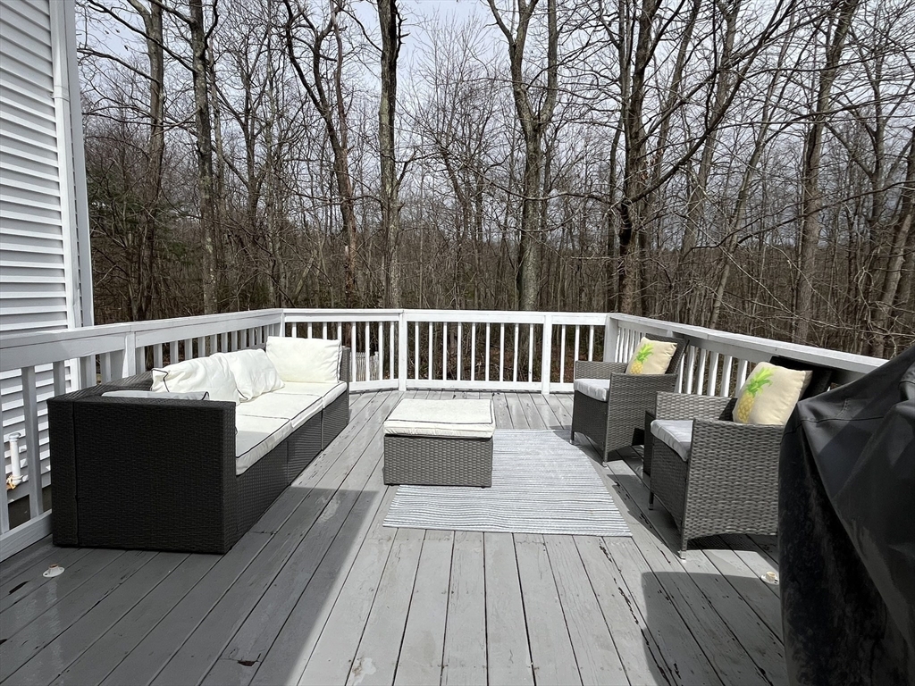 2 Pierce Circle Paxton, MA 01612 - Photo 31 of 31 a view of balcony with wooden floor and outdoor seating