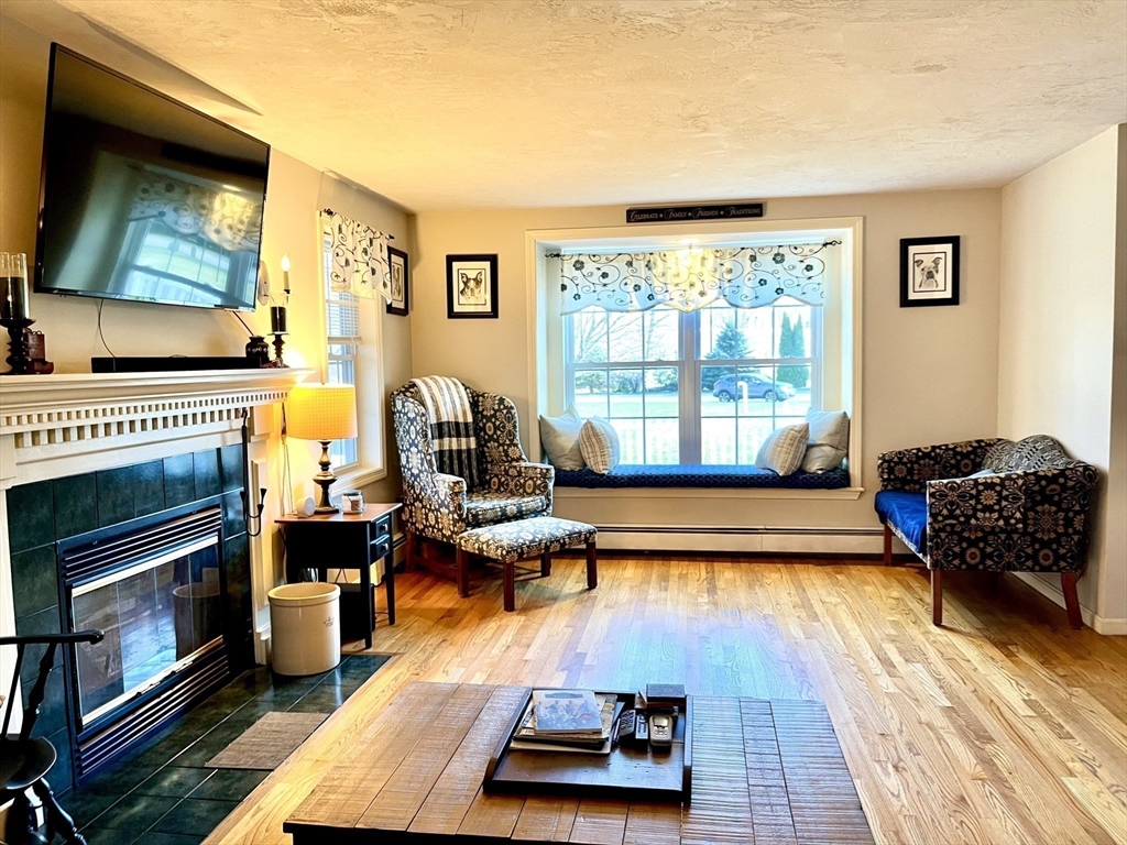 2 Pierce Circle Paxton, MA 01612 - Photo 5 of 31 a living room with furniture fireplace and flat screen tv