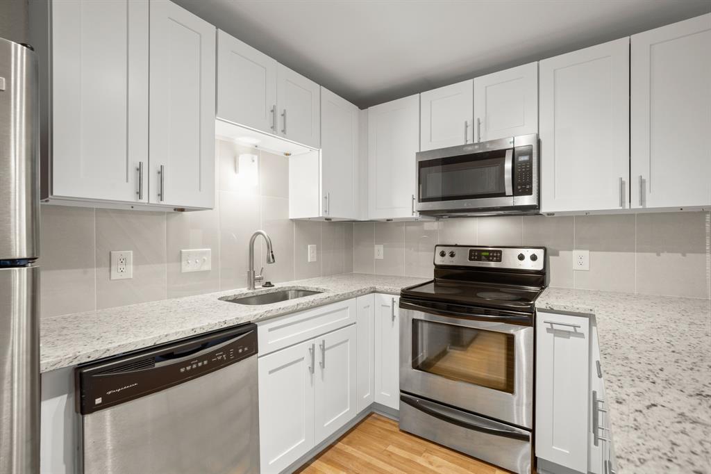 1013 West 23rd Street, Unit 104 Austin, TX 78705 - Photo 5 of 11 Kitchen close up showing the elegance and appliances