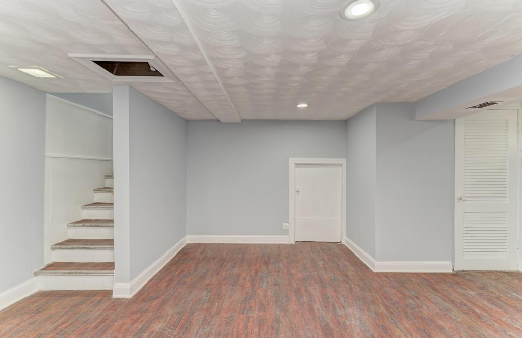 1411 West 114th Place Chicago, IL 60643 - Photo 20 of 25 wooden floor in an empty room with a window