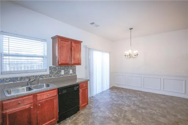 a bathroom with a sink double vanity and a shower
