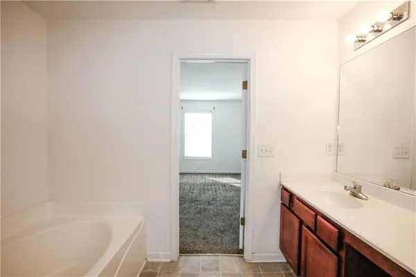 a bathroom with a sink and a bathtub
