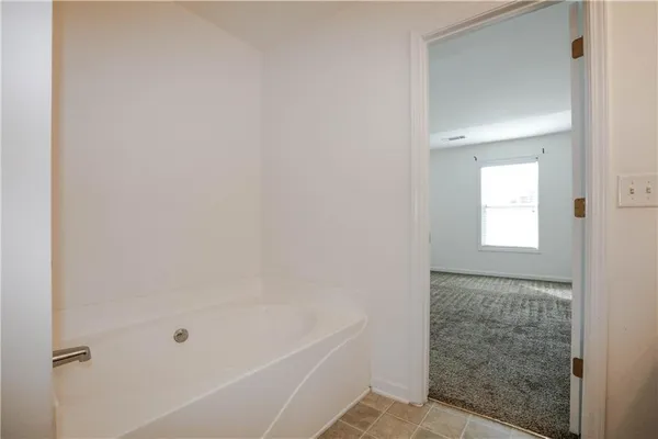 a bathroom with a bathtub