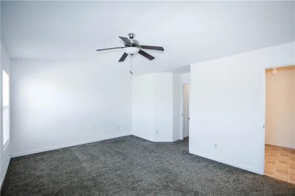 a view of a small space with a fan