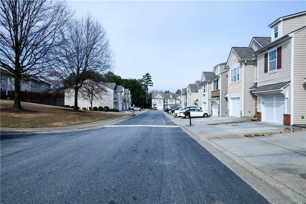 a view of road with large building