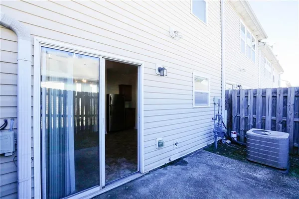 a view of a backyard with furniture