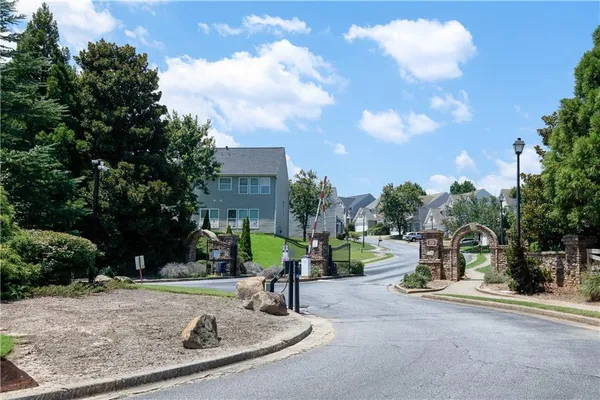 a view of a park with swings and slides