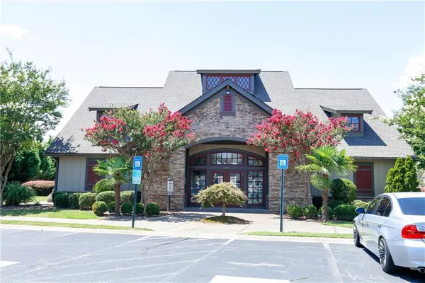 a front view of a house with yard