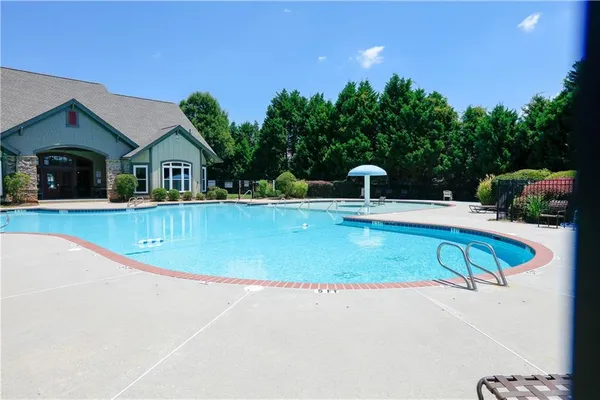 a view of a house with a swimming pool