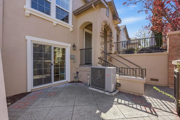 outdoor view of a house with a large window