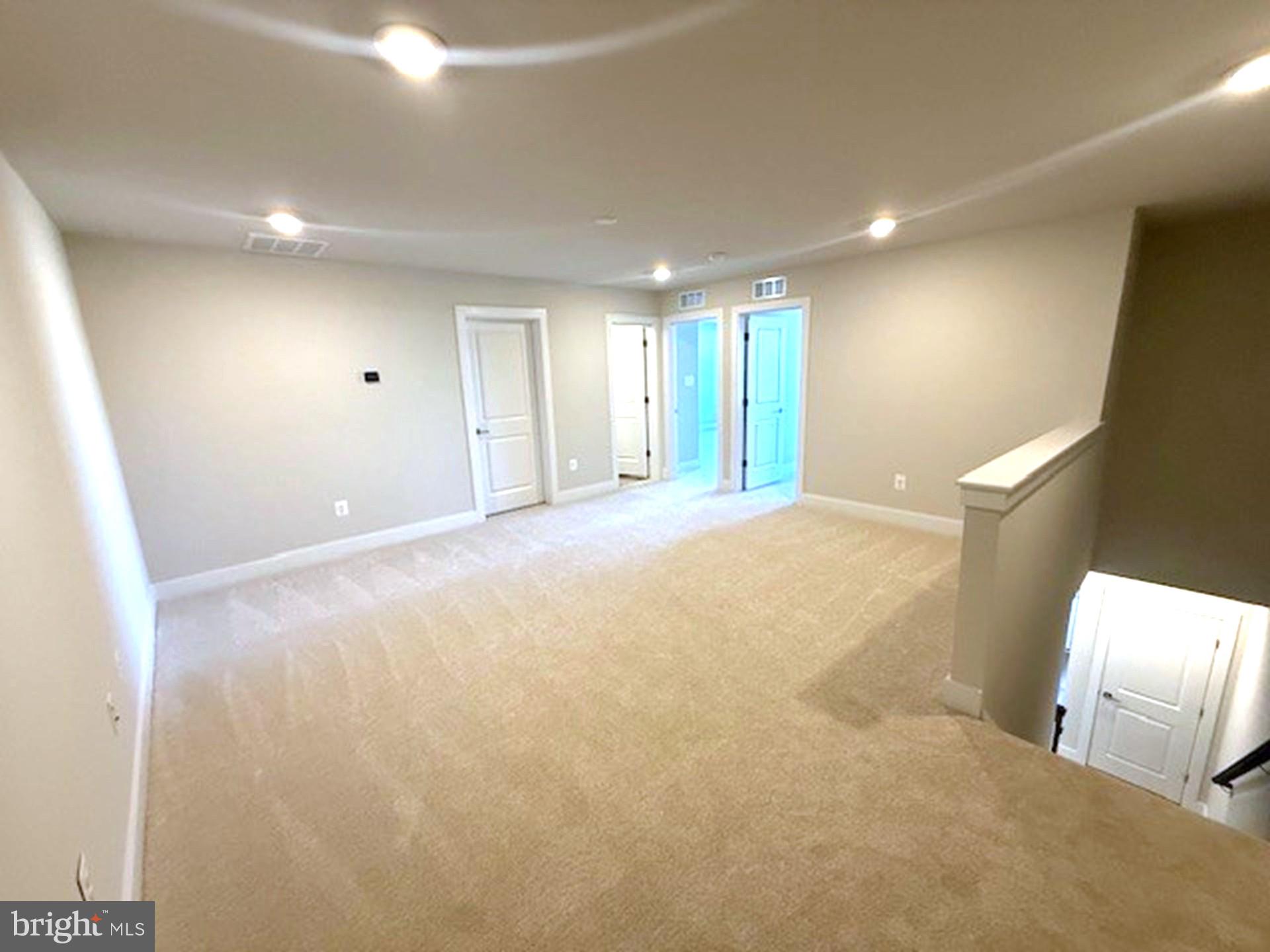 185 Merrick Way Ocean View, DE 19970 - Photo 13 of 19 a view of an empty room with a window