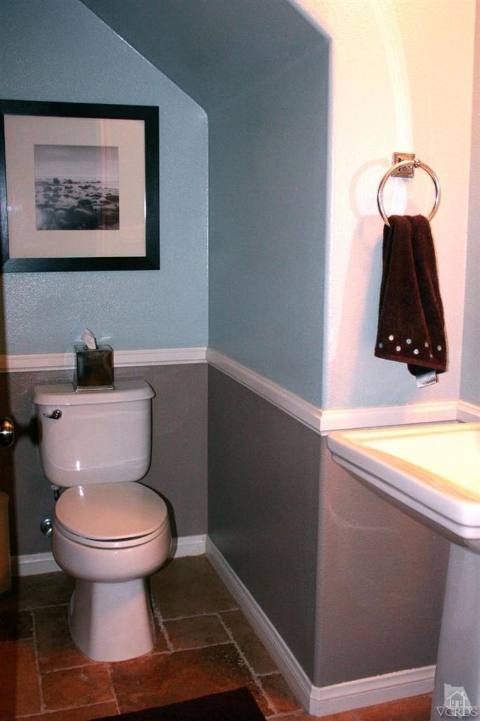 8435 Ranger Lane Chino, CA 91708 - Photo 22 of 40 a bathroom with a toilet and a vanity