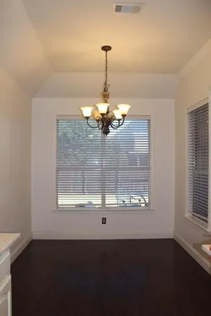 a dining room table in a room