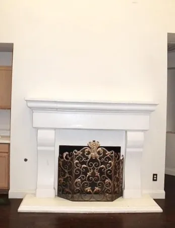 a view of a livingroom with a fireplace