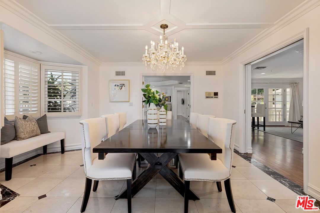 138 North Carson Road Beverly Hills, CA 90211 - Photo 6 of 22 a view of a dining room with furniture window and wooden floor