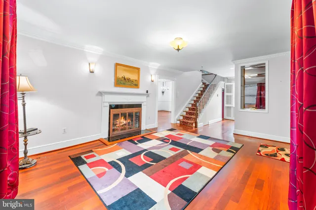 a bed room with a bed furniture and a fireplace