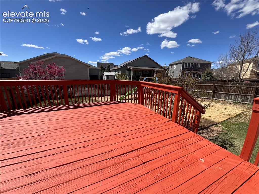 9362 St.George Road Peyton, CO 80831 - Photo 28 of 32 a view of balcony with wooden floor