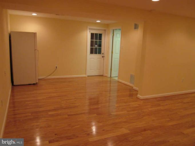 4100 Lees Corner Road Chantilly, VA 20151 - Photo 8 of 12 Basement with extra fridge and walk out to patio
