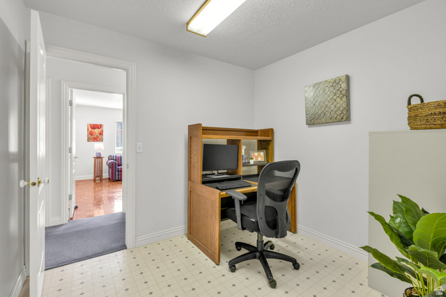 1060 West 2620th Street South Mapleton, UT 84664 - Photo 40 of 87 Office area featuring light flooring and a textured ceiling