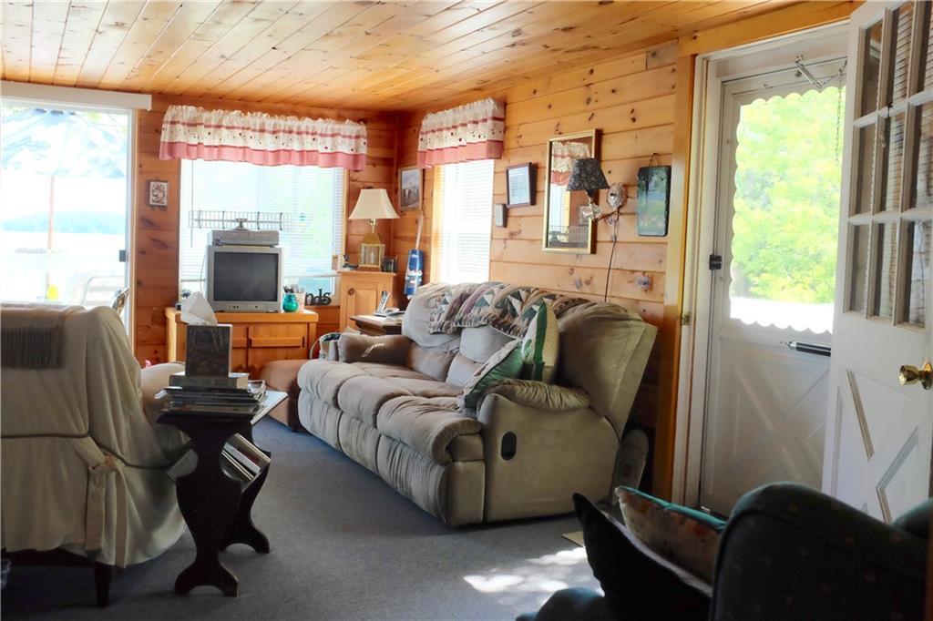 356 Stickney Hill Road Liberty, ME 04949 - Photo 10 of 26 Side door and living area.