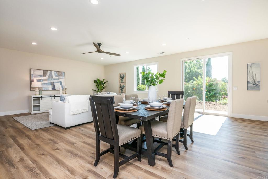 1904 Grey Rabbit Hollow Lane Fallbrook, CA 92028 - Photo 11 of 67 a dining room with furniture window and wooden floor