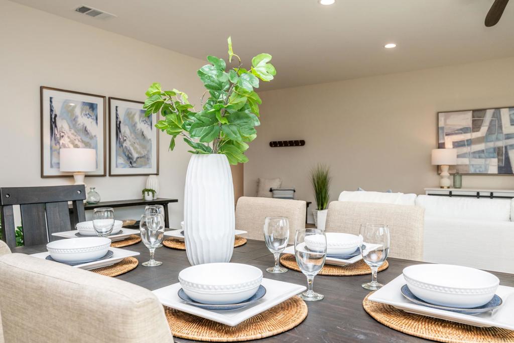 1904 Grey Rabbit Hollow Lane Fallbrook, CA 92028 - Photo 13 of 67 a living room with furniture and a potted plant