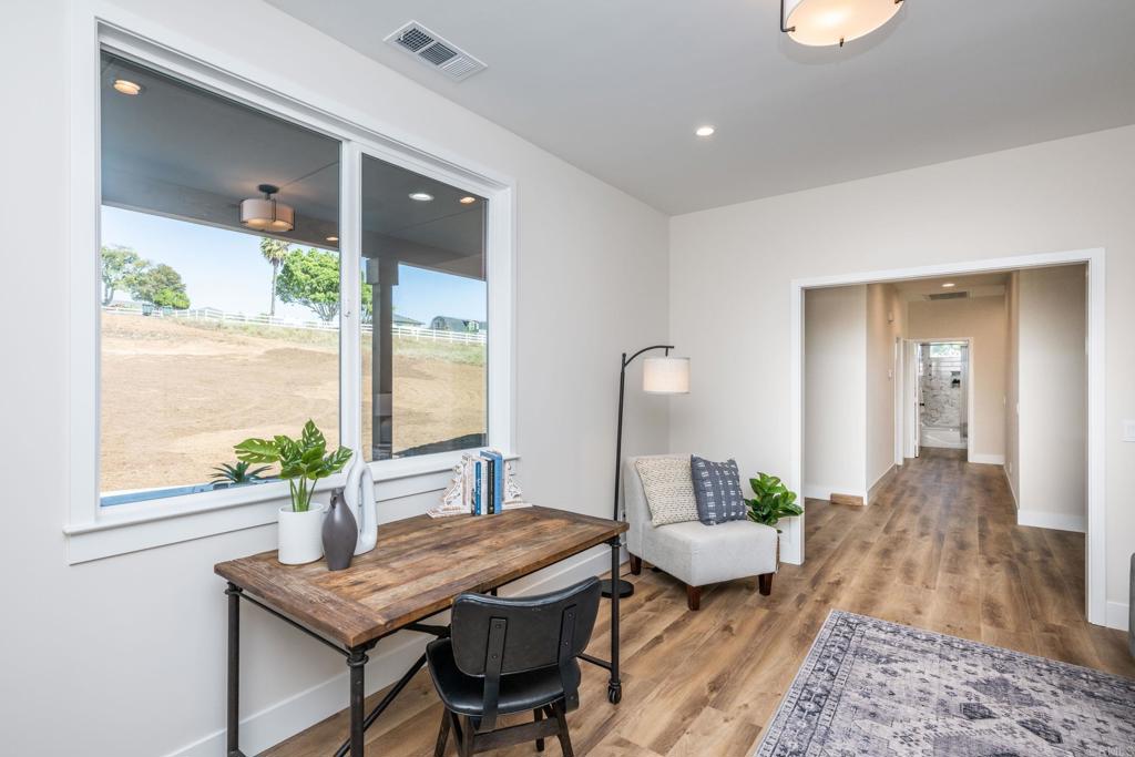 1904 Grey Rabbit Hollow Lane Fallbrook, CA 92028 - Photo 34 of 67 a bedroom with furniture and a window