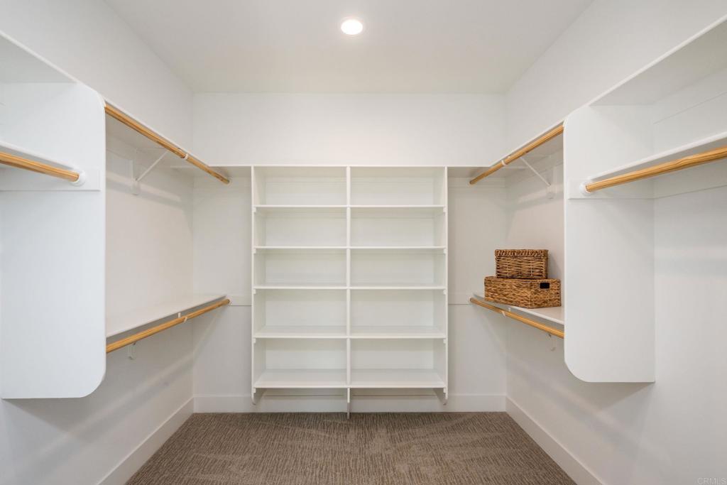 1904 Grey Rabbit Hollow Lane Fallbrook, CA 92028 - Photo 48 of 67 a view of walk in closet with empty racks