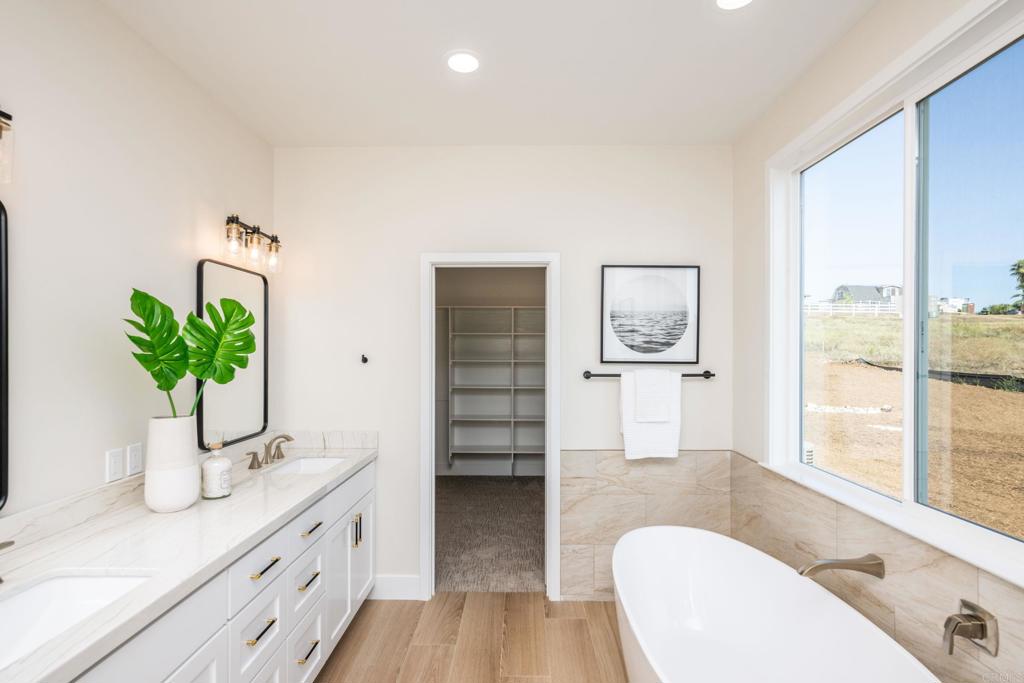 1904 Grey Rabbit Hollow Lane Fallbrook, CA 92028 - Photo 51 of 67 a living room with furniture and a potted plant