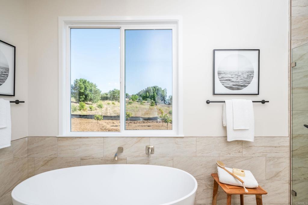 1904 Grey Rabbit Hollow Lane Fallbrook, CA 92028 - Photo 53 of 67 a bathroom with a sink and a mirror