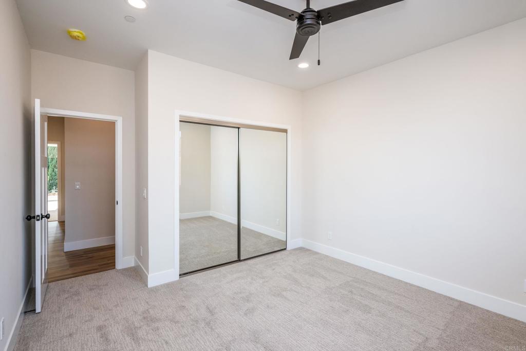 1904 Grey Rabbit Hollow Lane Fallbrook, CA 92028 - Photo 58 of 67 an empty room with a ceiling fan