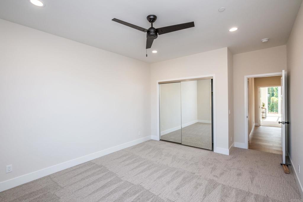 1904 Grey Rabbit Hollow Lane Fallbrook, CA 92028 - Photo 59 of 67 an empty room with fan and entryway