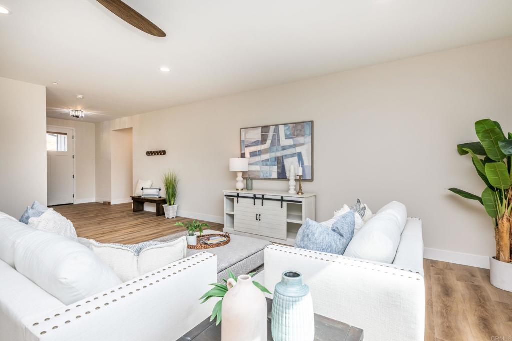1904 Grey Rabbit Hollow Lane Fallbrook, CA 92028 - Photo 6 of 67 a living room with furniture and white walls