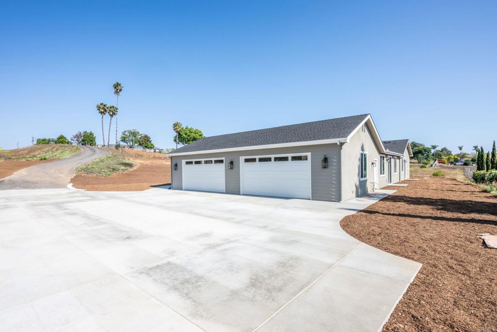 1904 Grey Rabbit Hollow Lane Fallbrook, CA 92028 - Photo 62 of 67 a view of a house with a outdoor space