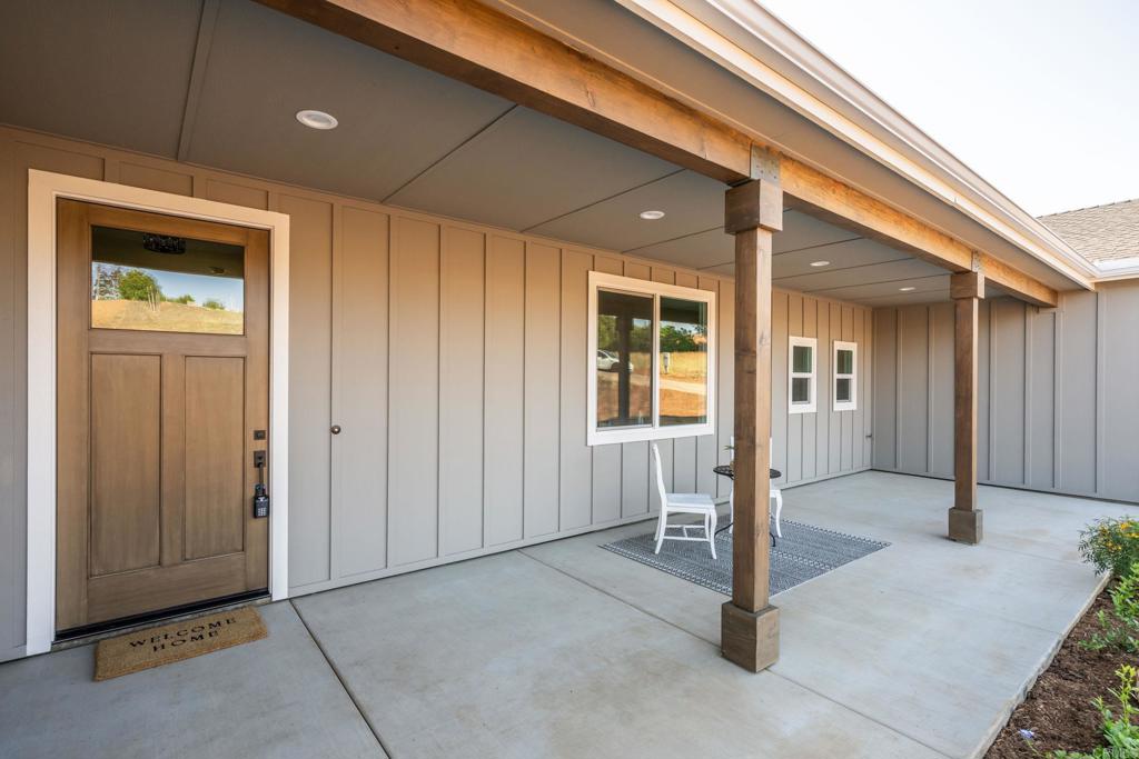 1904 Grey Rabbit Hollow Lane Fallbrook, CA 92028 - Photo 66 of 67 a view of a hallway with wooden shelves