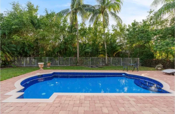 a view of swimming pool with patio